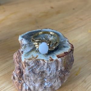 Vintage. Beautiful Opal and faux diamond ring.
